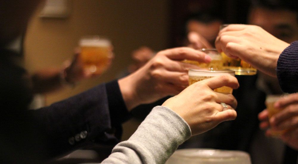 Group of People Raising a Toast Group of People Raising a Toast